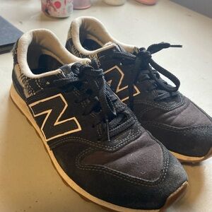 Size 7 New Balance black with plaid hardly worn